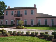 Pink house prior to installation of shutters