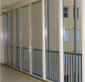 impact sliders used as hurricane shutters for lanai
