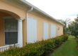 accordion shutters on a house southwest florida