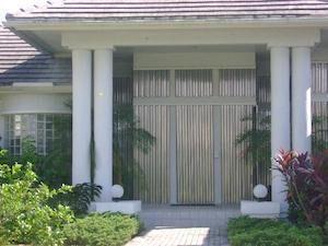 hurricane shutter panels on a home in fort myers florida