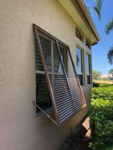bahama shutters on a home in southwest florida