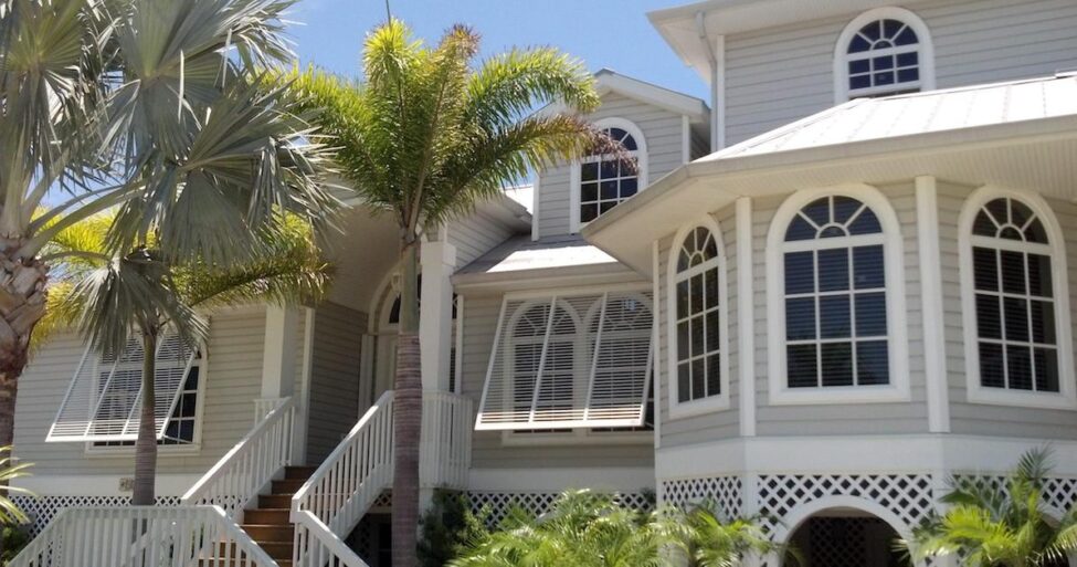 hurricane-shutters-pictures Bahama hurricane shutters over windows of a residential home