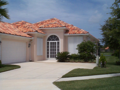 picture of house with accordion shutters