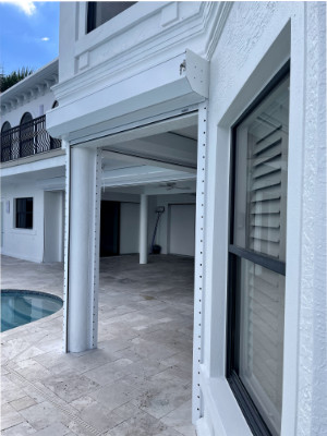 manual-roll-down-hurricane-shutters-fort-myers manual roll down hurricane shutters near patio