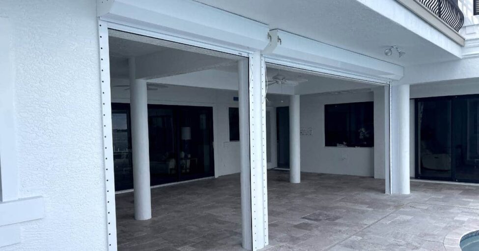 motorized roll down shutters on home in cape coral