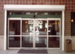 white security shutters on commercial building