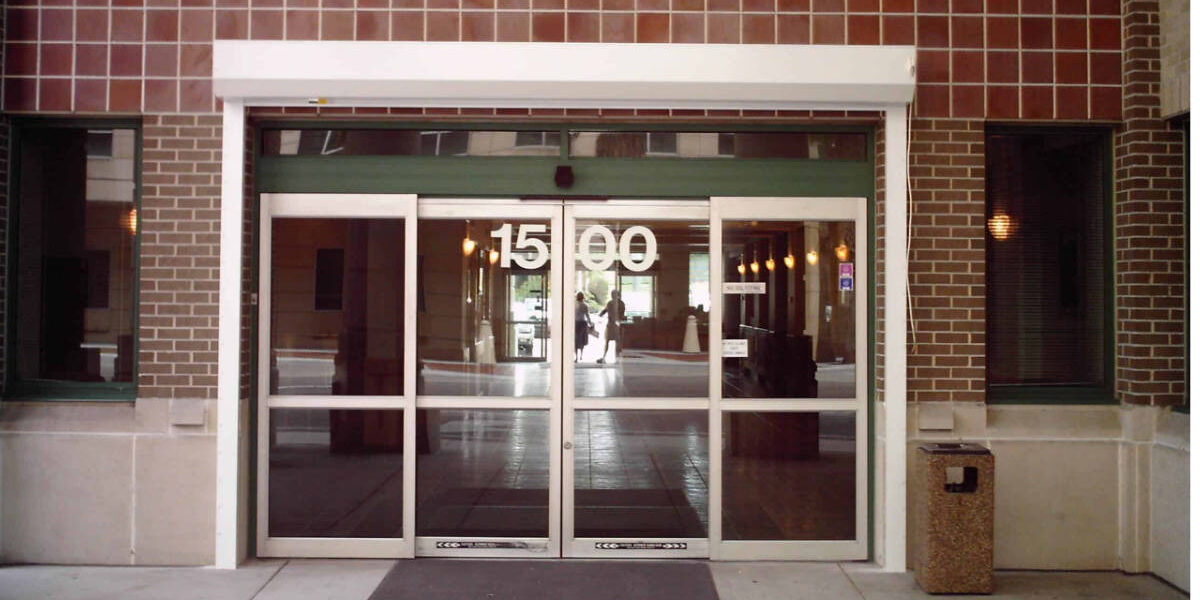 white security shutters on commercial building