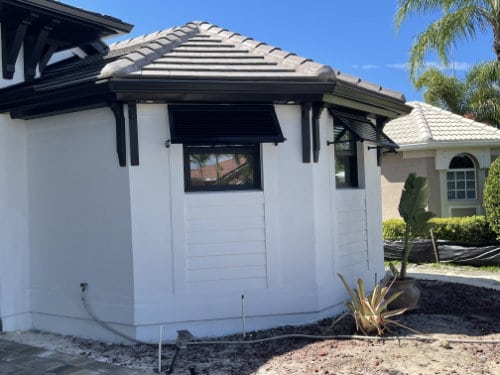modern home with bahama shutters