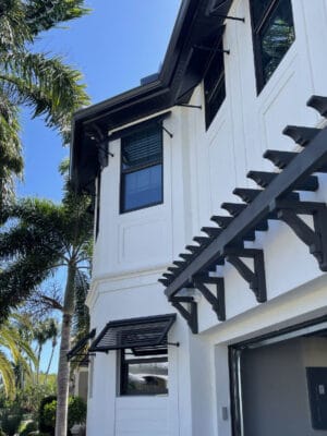 modern home with bahama shutters