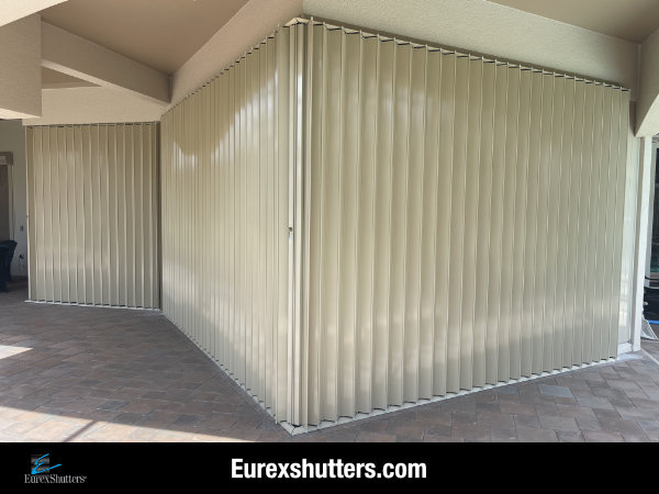 functional accordion shutters on a home in estero fl