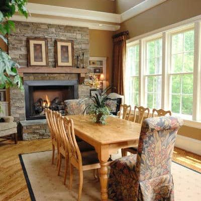 White vinyl impact windows in a tan dining room.