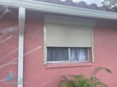 Beige rolling shutters on a home in Lehigh Acres