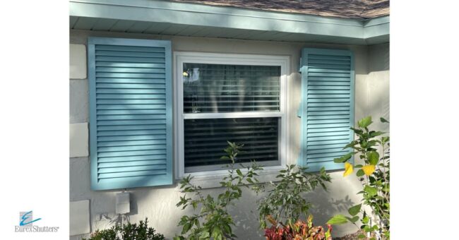 Blue Colonial hurricane shutters installed on a home in Venice Florida