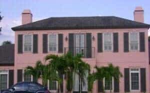 Dark colonial hurricane shutters