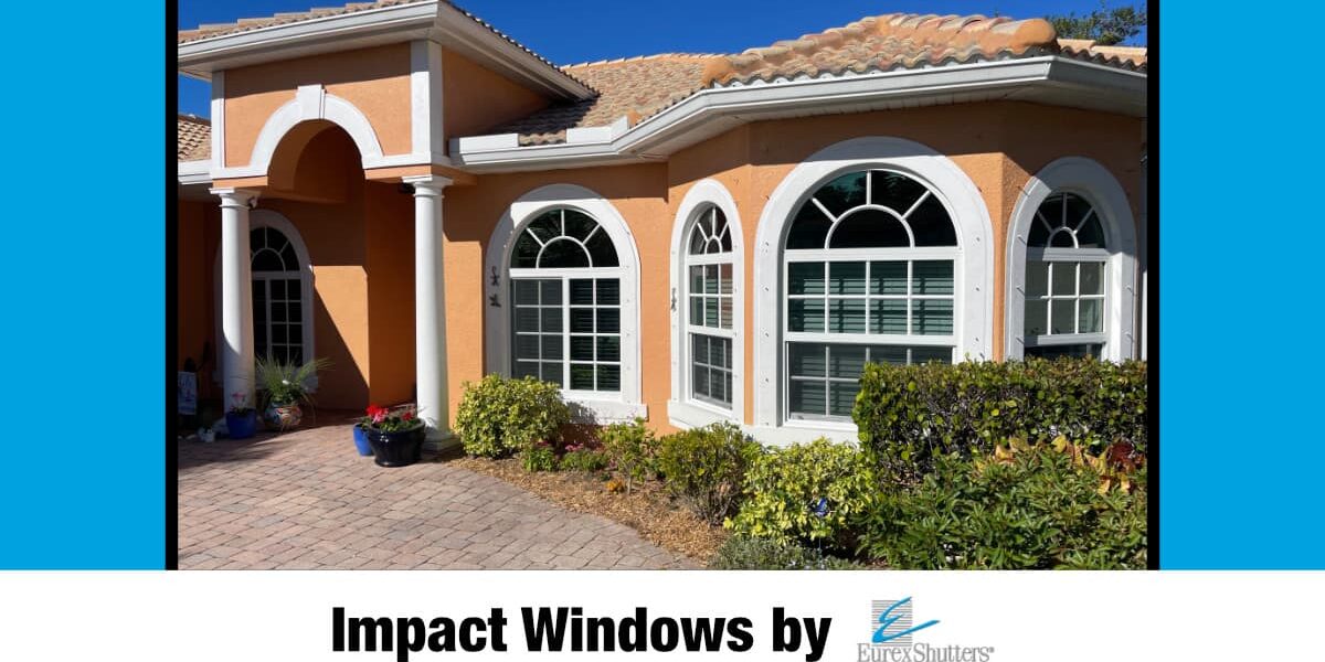 impact-windows-install-naples-fl-010123 White vinyl impact windows on a home in Naples Florida