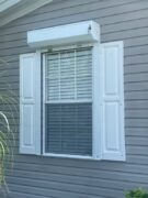 White manual roll down shutters open