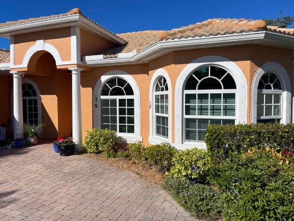 Exterior view of 5 custom, impact windows installed with custom, impact
