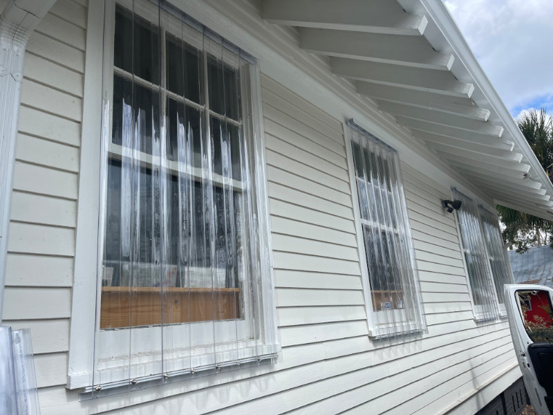 Clear panels over the windows of a home in Fort Myers