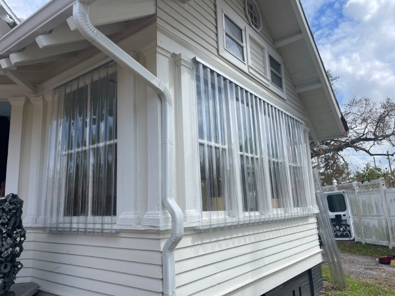 Clear panels over the windows of a home in Fort Myers