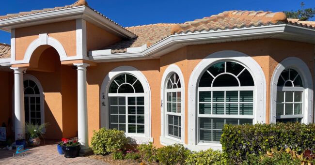 White impact windows with white frames