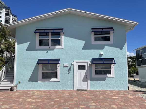 Blue half Bahama shutters