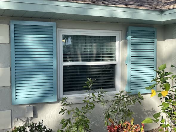 Blue Impact Colonial Shutters
