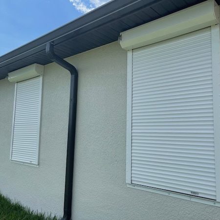 Low profile roll down shutters