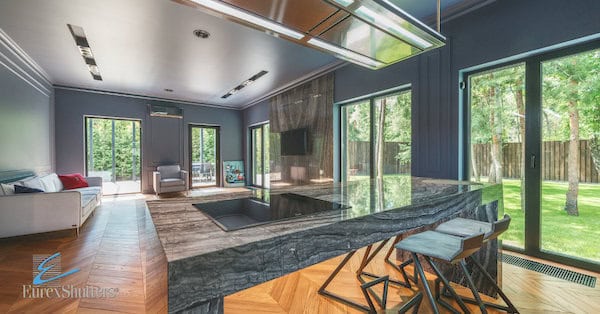 A room filled with sliding glass doors.