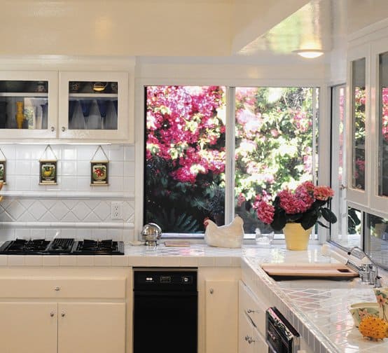 Sliding window behind a counter in a kitchen. sliding-