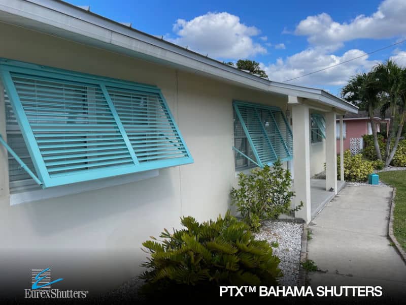 Custom Eurex Shutters PTX™ Bahama Shutters powder coated in custom blue.