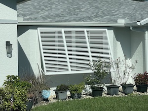 Bahama hurricane shutters on a ranch home in Lehigh Acres.