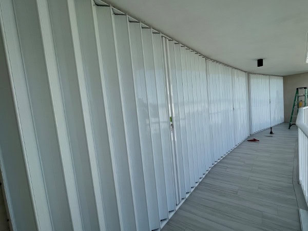 White accordion shutters