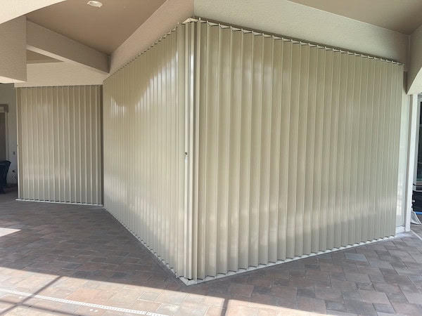 Tan accordion shutters