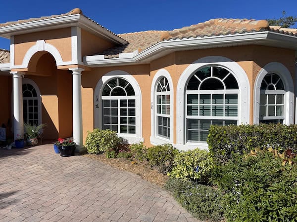 Home with shatterproof or unbreakable, laminated glass windows